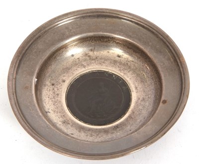 Lot 53 - A silver coin set dish of circular form having...