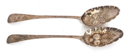 Lot 72 - Two Georgian silver berry spoons with Old...