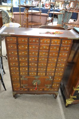 Lot 628 - A contemporary Chinese apothocary cabinet...