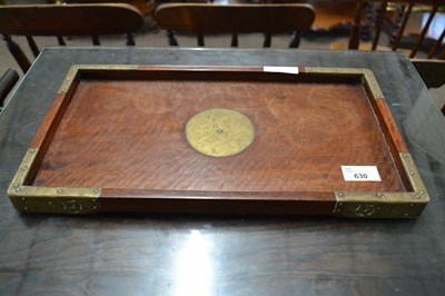 Lot 630 - A Chinese hardwood and brass bound serving...