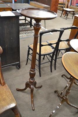 Lot 638 - An early 20th Century mahogany torchere plant...