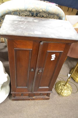 Lot 642 - A small Victorian cupboard with two panelled...