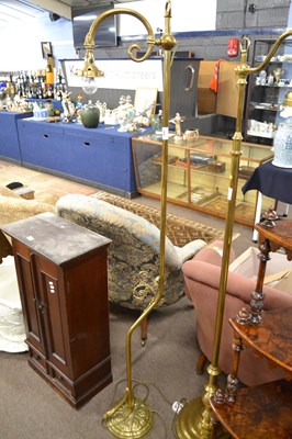 Lot 643 - An early 20th Century brass standard lamp in...