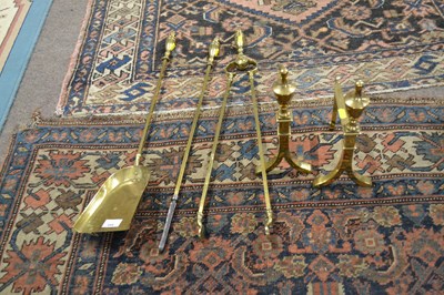 Lot 648 - A set of three Victorian brass fire tools...