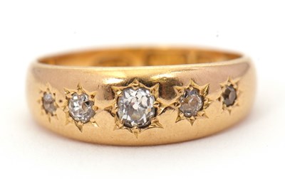 Lot 3 - A five stone diamond ring, the five graduated...