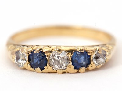 Lot 4 - A sapphire and diamond ring, the alternating...