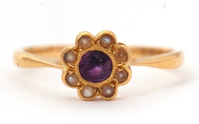 Lot 15 - An amethyst and cultured pearl ring, the...