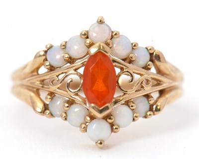 Lot 16 - A 9ct opal ring, set with a central marquise...