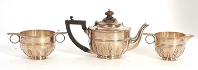 Lot 145 - An Edwardian silver three piece tea service of...