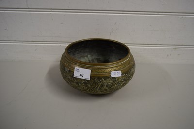 Lot 46 - BRASS BOWL WITH MOULDED FLORAL DECORATION