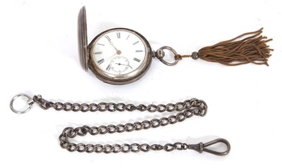 Lot 202 - A silver Hunter pocket watch with a silver...