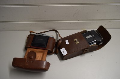 Lot 55 - TWO CAMERAS IN LEATHER CASES