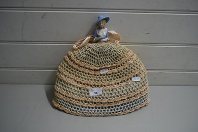 Lot 58 - TEA COSY WITH CERAMIC DOLL
