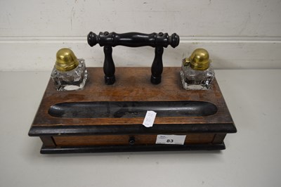 Lot 83 - WOODEN DESK SET WITH TWO INKWELLS WITH BRASS...