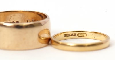 Lot 41 - Two gold rings: an 18ct gold ring, hallmarked...