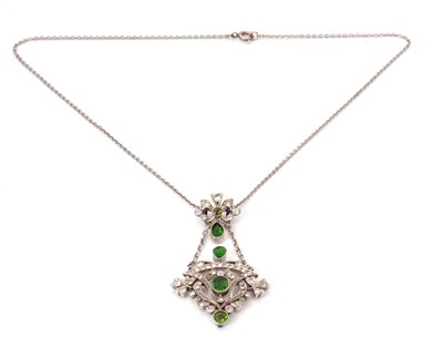 Lot 101 - An early 20th century necklace, set with green...