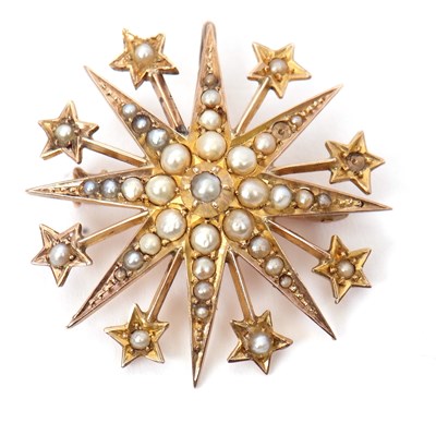 Lot 81 - A 9ct seed pearl star brooch, the eight...