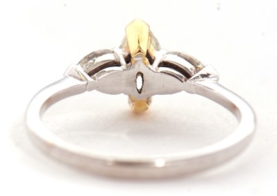Lot 66 - An 18ct yellow and white diamond ring, the...