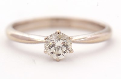 Lot 40 - An 18ct diamond solitaire ring, the round...