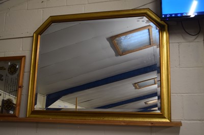 Lot 32 - A contemporary bevelled over mantel mirror in...