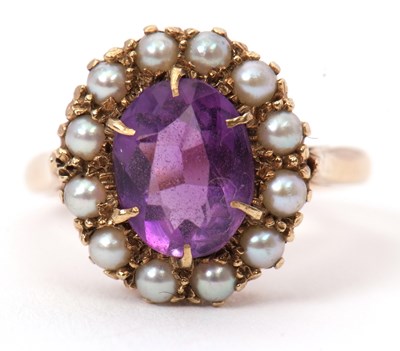 Lot 62 - An amethyst and cultured pearl ring, the...