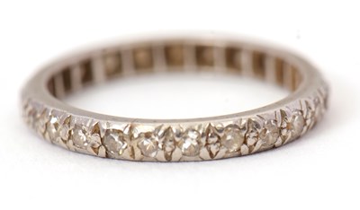 Lot 23 - A diamond eternity ring, full hoop eternity...