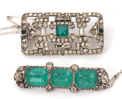 Lot 113 - Two Art Deco brooches, the first set with...