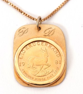 Lot 125 - A 1/10oz Krugeraand pendant and chain, the...