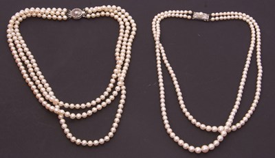 Lot 209 - Two cultured pearl necklaces: to include a two...