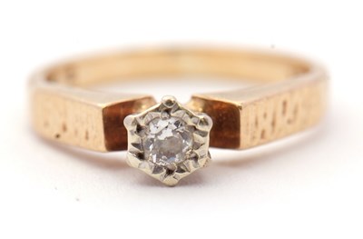 Lot 74 - A diamond solitaire ring, the illusion mounted...