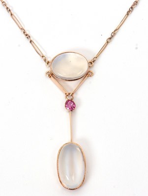 Lot 86 - A moonstone and pink stone necklace, the oval...