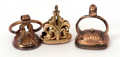 Lot 149 - Three fobs: to include a marquise carnelian...