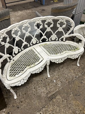 Lot 1042 - A cast metal garden bench