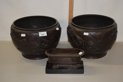 Lot 147 - A pair of Japanese bronze metal jardinieres...