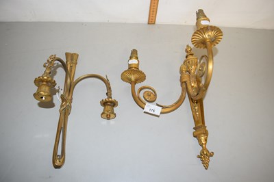 Lot 176 - Two non matching gilt metal wall sconces of...