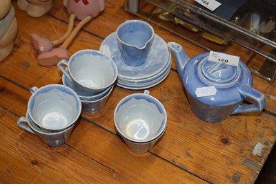 Lot 189 - A blue glazed coffee set