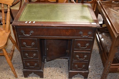 Lot 260 - Small reproduction kneehole desk with green...