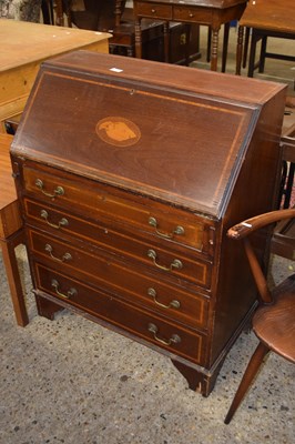 Lot 275 - An Edwardian mahogany bureau with inlaid shell...