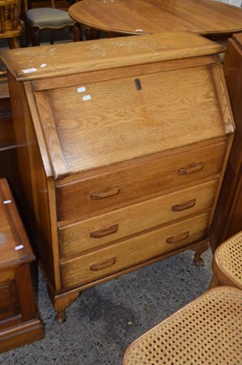 Lot 282 - Vintage oak three drawer bureau on cabriole legs