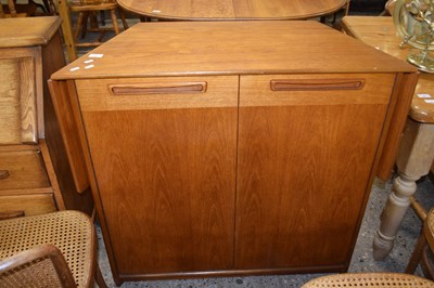 Lot 283 - A retro mid Century teak drop leaf bar cabinet...