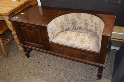 Lot 285 - An oak telephone seat