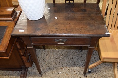 Lot 295 - A 19th Century oak side table on casters