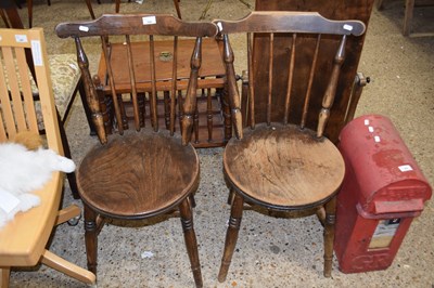 Lot 298 - A pair of Victorian elm seated and stick back...