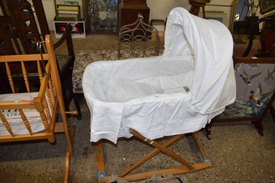 Lot 310 - A Silver Cross rocking cot with wooden frame