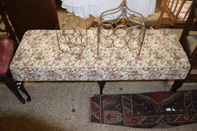 Lot 316 - A floral upholstered six leg stool