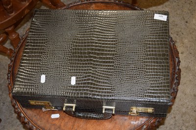 Lot 321 - A faux crocodile skin briefcase by John...