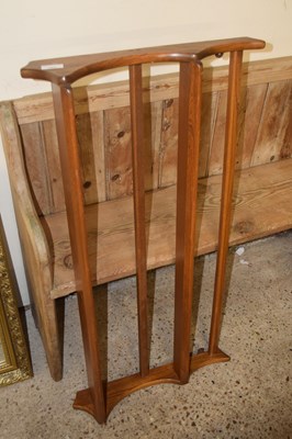 Lot 345 - An Ercol two tier wall shelf