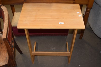 Lot 701 - A modern light wood side table