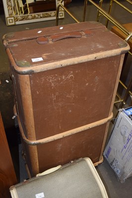 Lot 717 - A vintage wooden bound steamer trunk