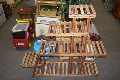 Lot 757 - A wooden plant stand